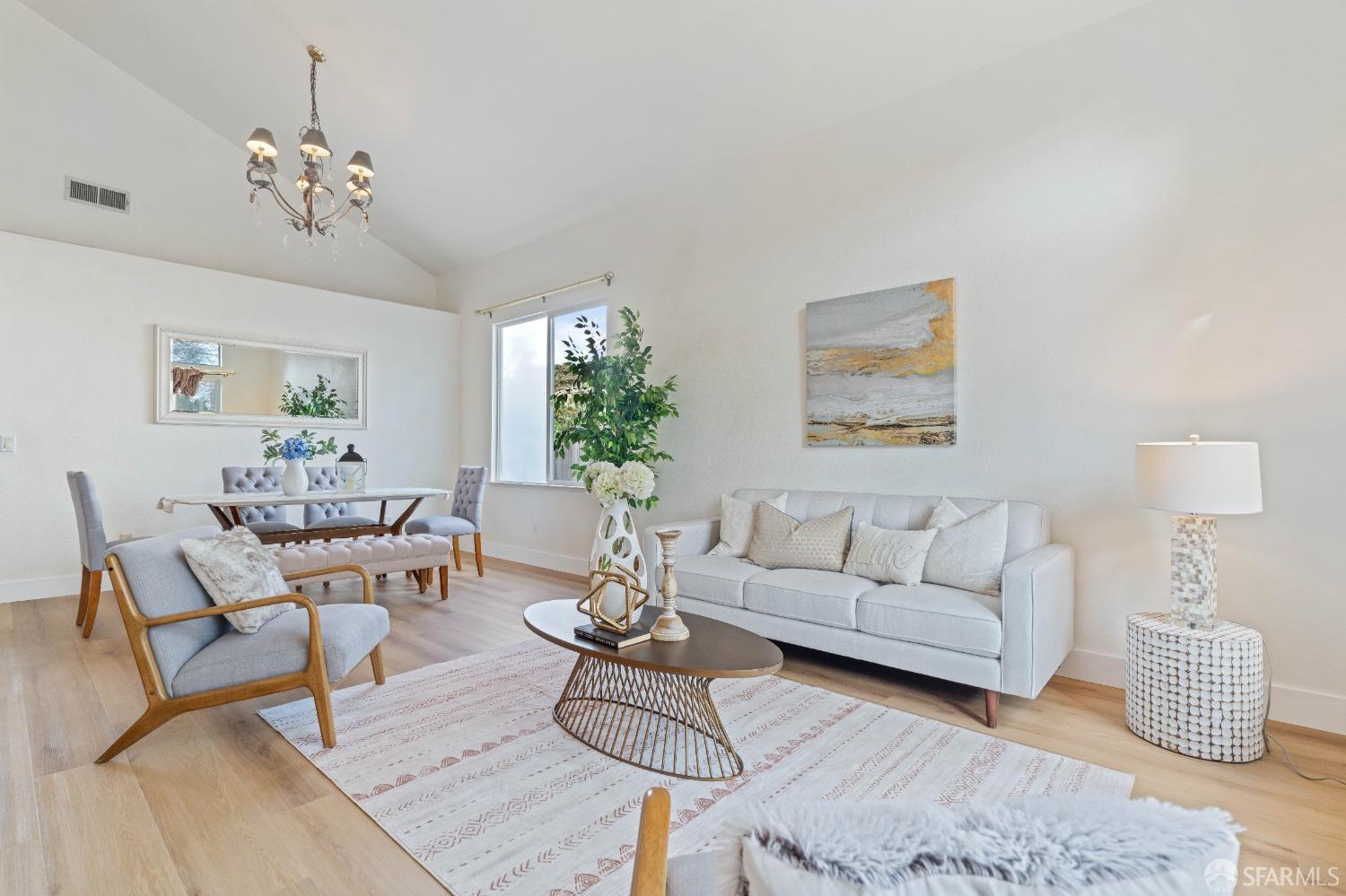 2626 Orange Way Antioch, CA 94531 - Photo 9 of 56 a living room with furniture and a chandelier