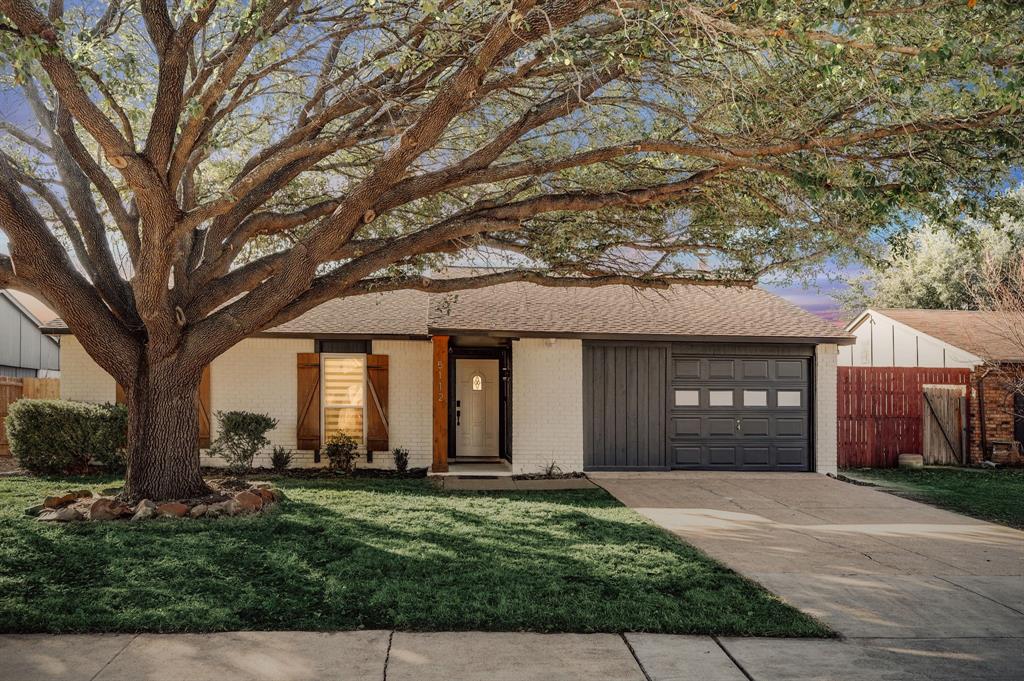 5112 Arbor Glen Road The Colony, TX 75056 - Photo 2 of 40 View of front of home featuring a garage and a yard