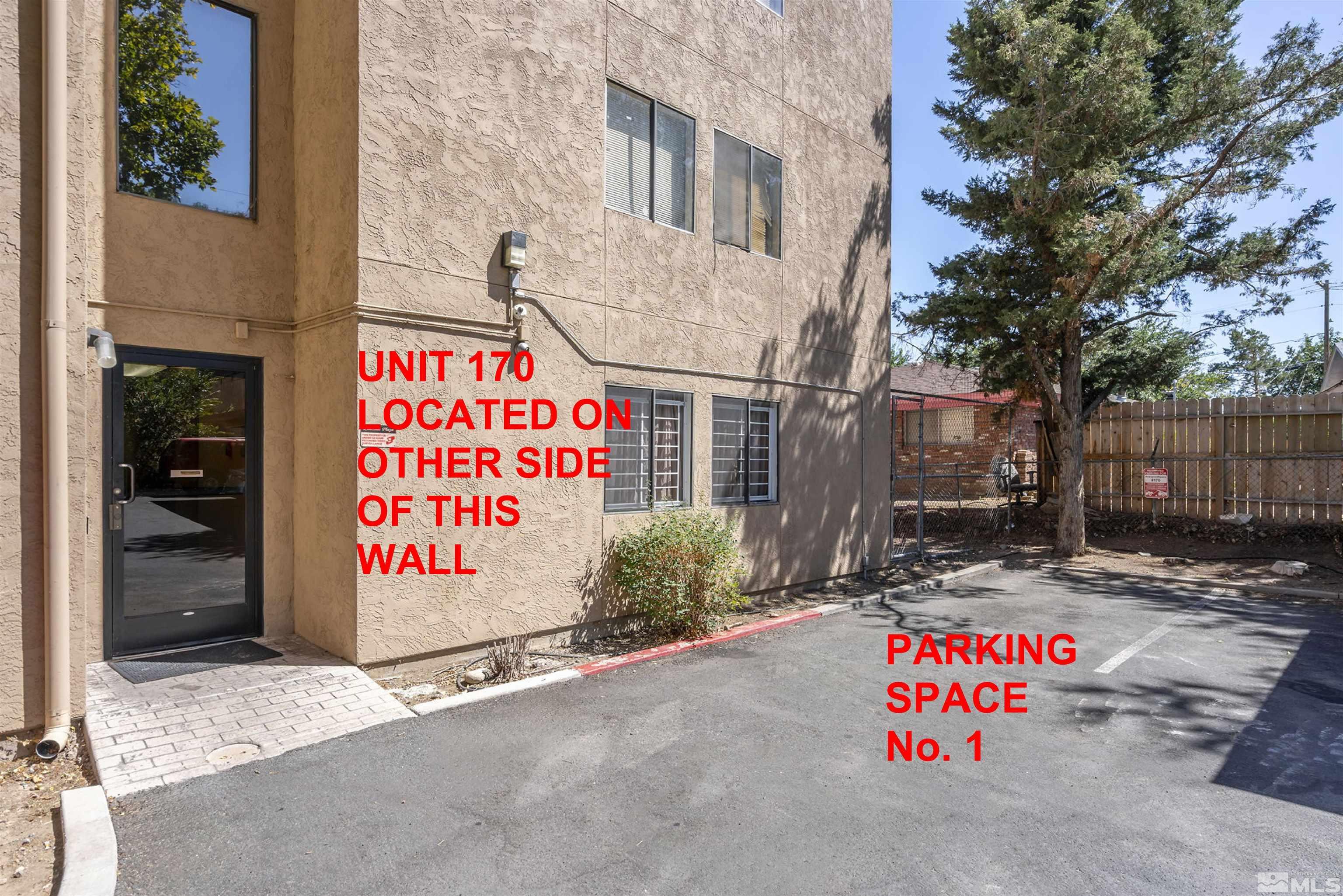 1000 Beck Drive, Unit 170 Reno, NV 89509 - Photo 1 of 23 a sign on the side of a street