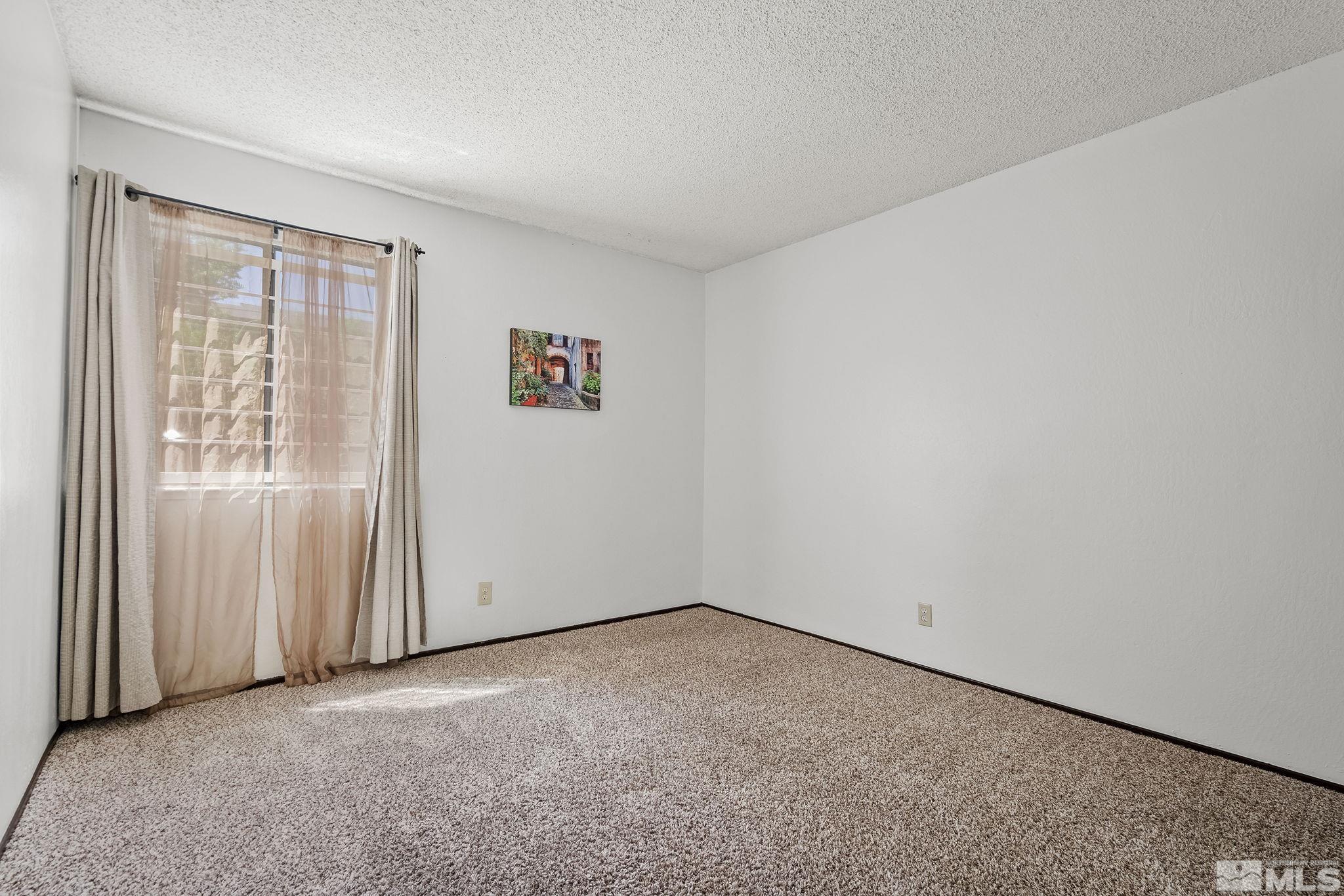 1000 Beck Drive, Unit 170 Reno, NV 89509 - Photo 18 of 23 an empty room with windows