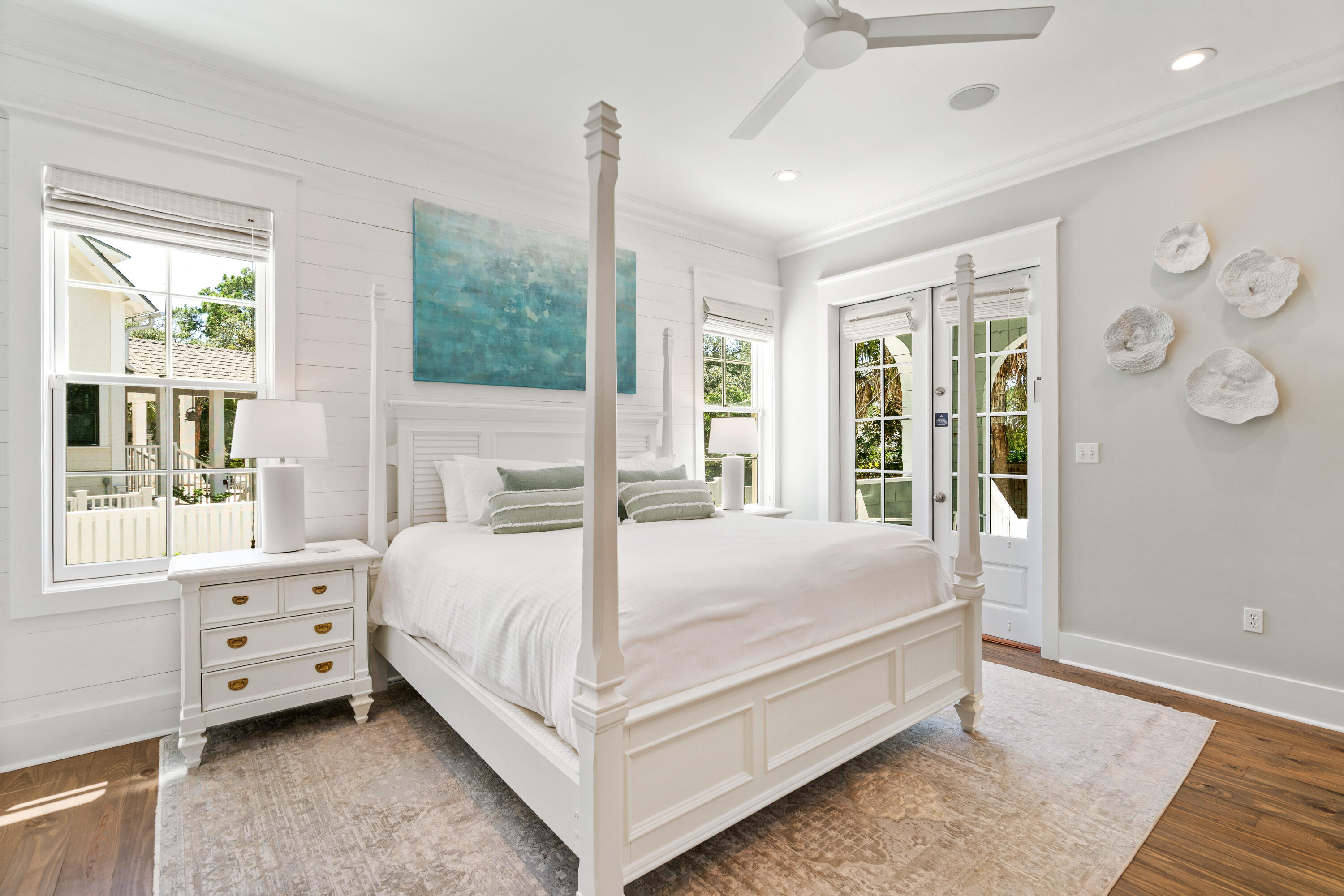 148 Coopersmith Lane Inlet Beach, FL 32461 - Photo 13 of 82 a bed sitting in a bedroom next to a window