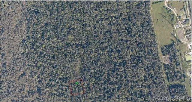 a picture of a bathroom with a shower and a mirror