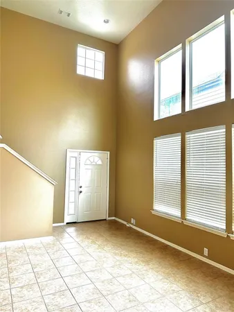 a view of an empty room and window