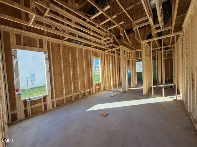 225 Seahawk Way Zebulon, NC 27597 - Photo 4 of 5 a view of an empty room with windows