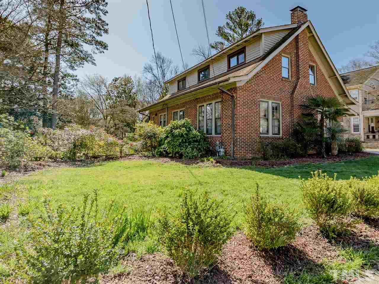 1902 Alexander Road Raleigh, NC 27608 - Photo 2 of 30 a front view of house with yard and green space