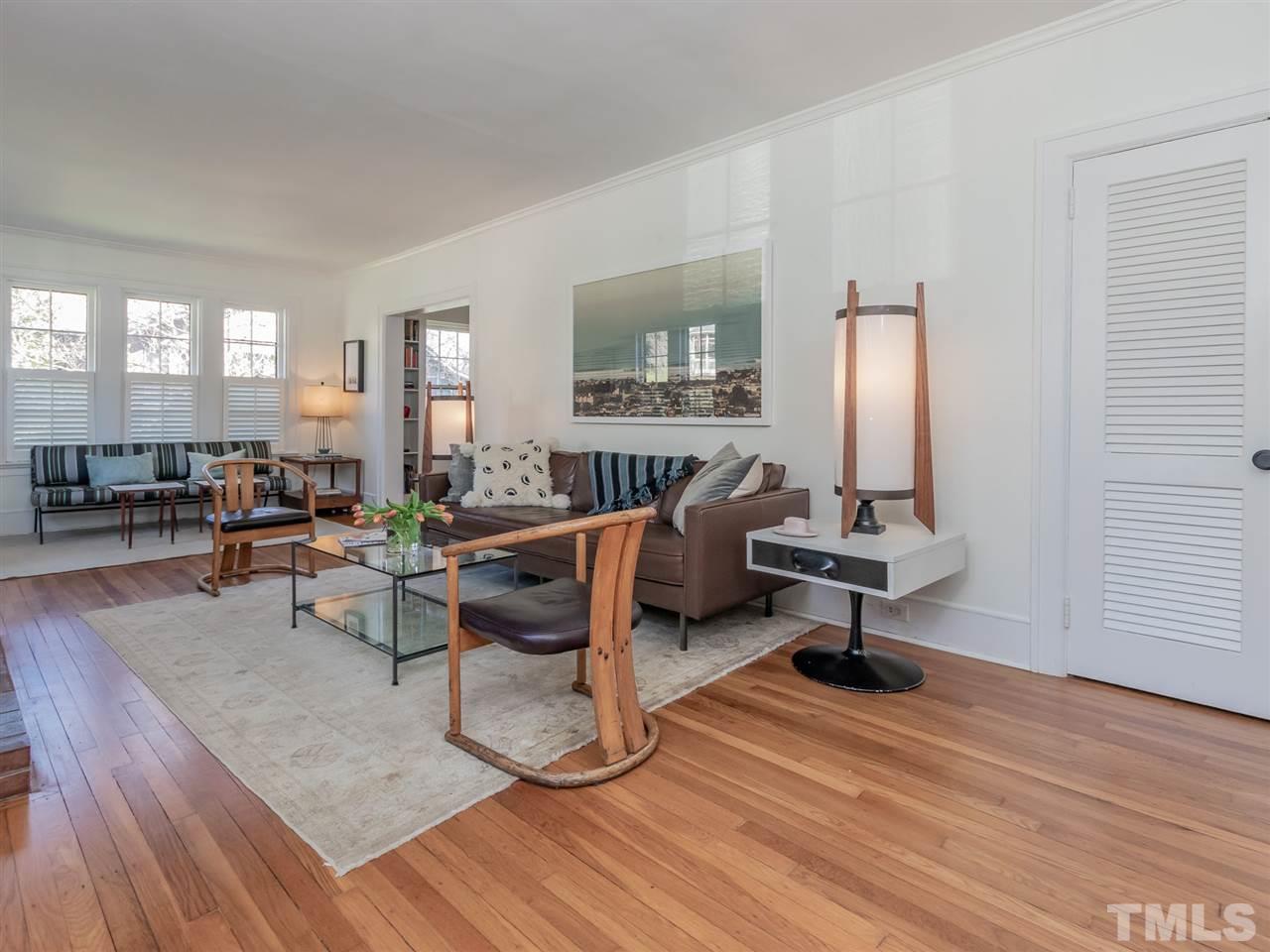 1902 Alexander Road Raleigh, NC 27608 - Photo 6 of 30 a living room with furniture and a wooden floor
