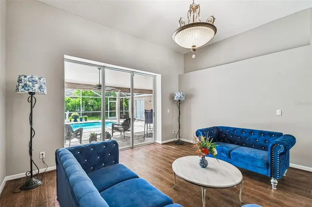 a living room with furniture and a window