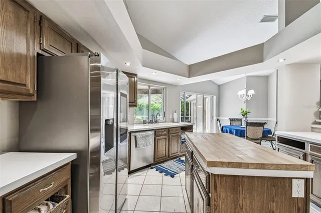 an aerial view of residential house with outdoor space and street view