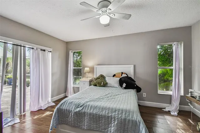 a view of a patio with chairs and a table
