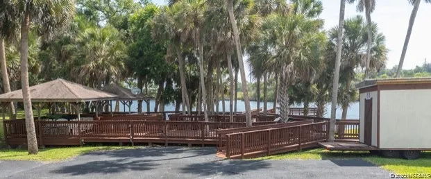 a view of outdoor space with wooden deck