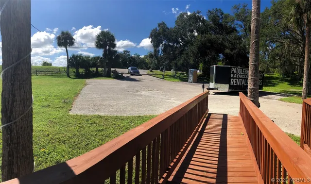 a view of swimming pool from a balcony