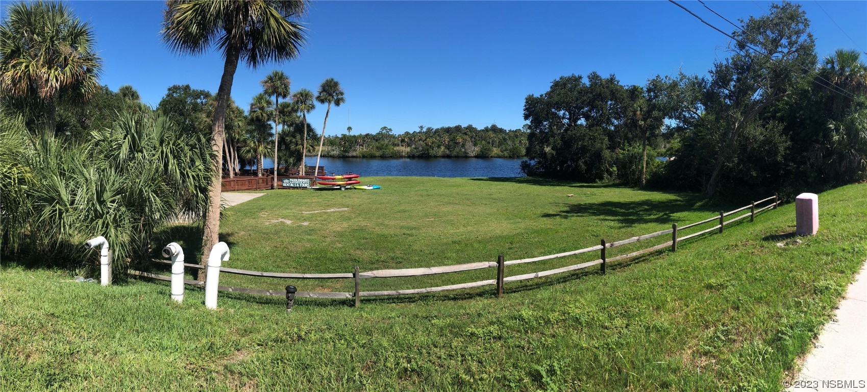 1003-1005 Highway 1 Ormond Beach, FL 32174 - Photo 28 of 52 a view of a field with plants and trees