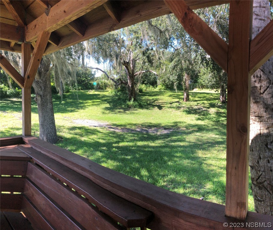 1003-1005 Highway 1 Ormond Beach, FL 32174 - Photo 29 of 52 a view of swimming pool from a window