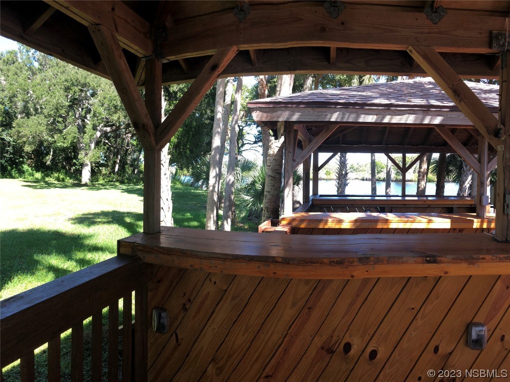 1003-1005 Highway 1 Ormond Beach, FL 32174 - Photo 31 of 52 a view of backyard with deck and outdoor space