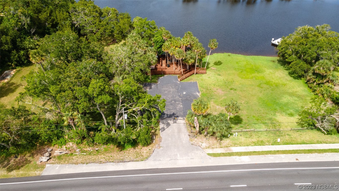1003-1005 Highway 1 Ormond Beach, FL 32174 - Photo 38 of 52 a view of a garden in a yard