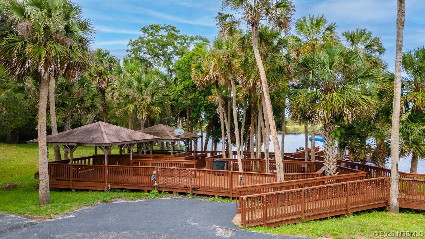 1003-1005 Highway 1 Ormond Beach, FL 32174 - Photo 39 of 52 a view of backyard with swimming pool and furniture