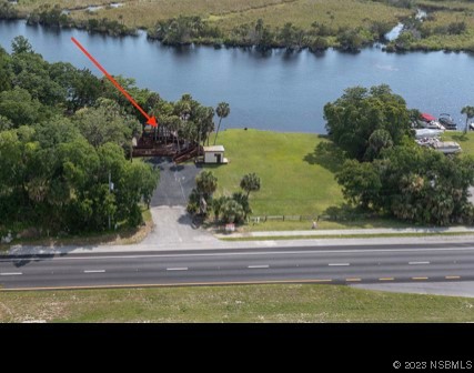 1003-1005 Highway 1 Ormond Beach, FL 32174 - Photo 4 of 52 a view of a lake with a floor and a yard