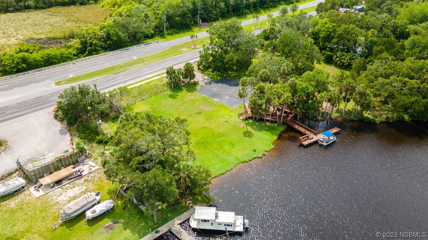 1003-1005 Highway 1 Ormond Beach, FL 32174 - Photo 51 of 52 a view of a back yard of the house
