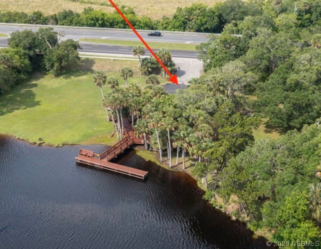 1003-1005 Highway 1 Ormond Beach, FL 32174 - Photo 6 of 52 a view of a swimming pool and outdoor space
