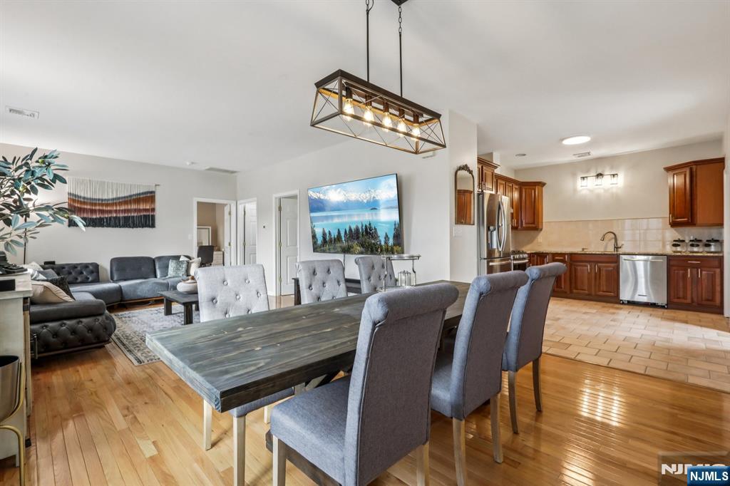 28 George Street Saddle Brook, NJ 07663 - Photo 24 of 50 a view of a dining room with furniture