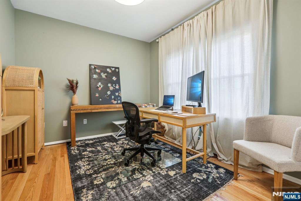 28 George Street Saddle Brook, NJ 07663 - Photo 34 of 50 a room with furniture and a window