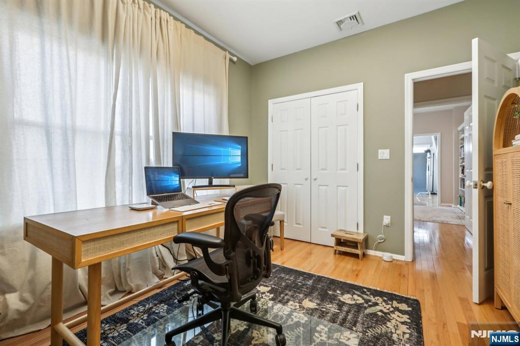 28 George Street Saddle Brook, NJ 07663 - Photo 35 of 50 a view of a workspace with furniture and bathroom