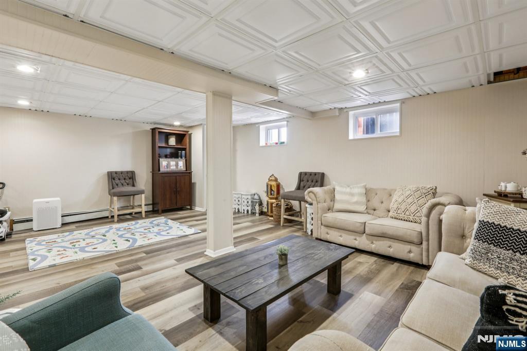 28 George Street Saddle Brook, NJ 07663 - Photo 42 of 50 a living room with furniture and wooden floor