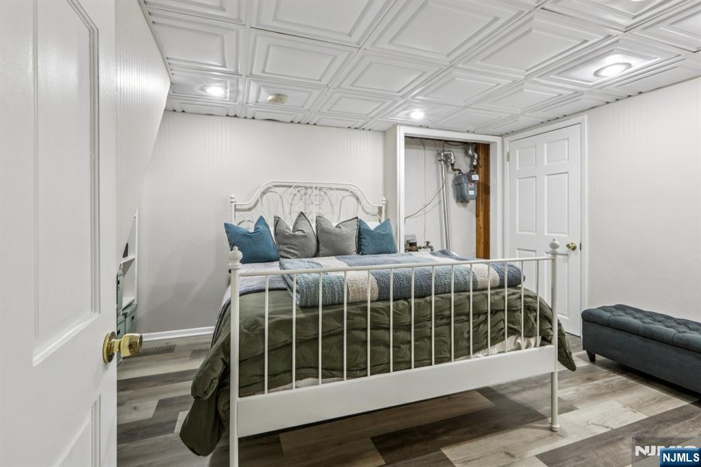 28 George Street Saddle Brook, NJ 07663 - Photo 43 of 50 a bedroom with a bed and a window