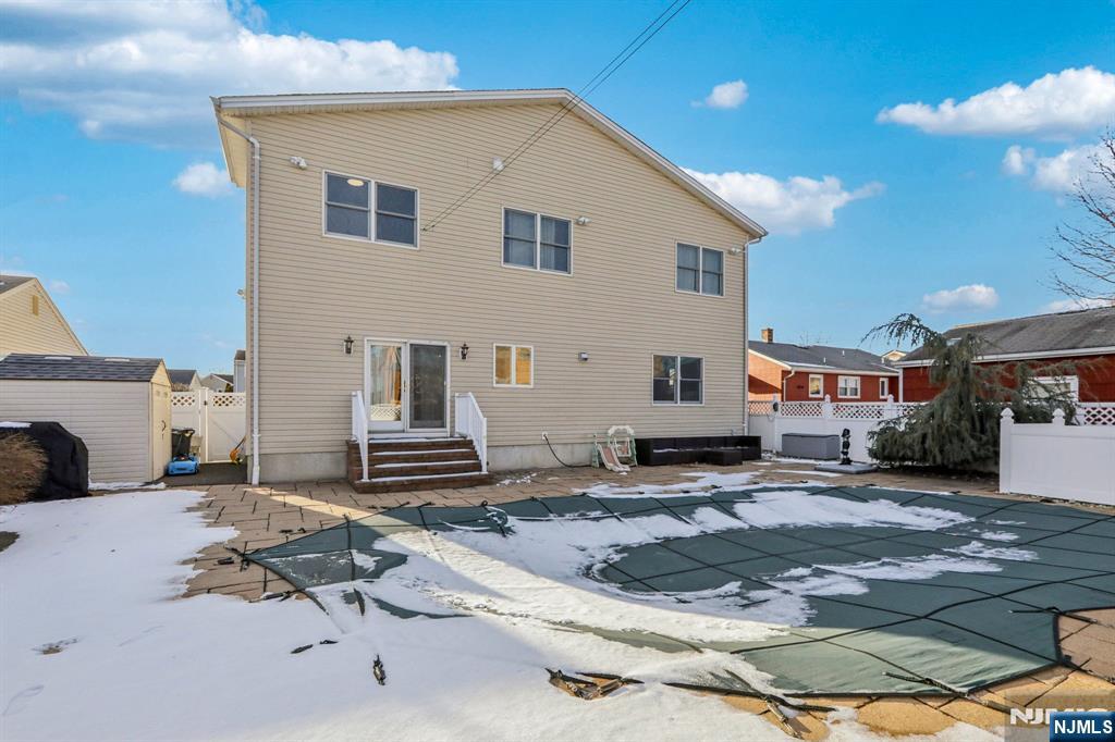 28 George Street Saddle Brook, NJ 07663 - Photo 48 of 50 a front view of a house with a rug