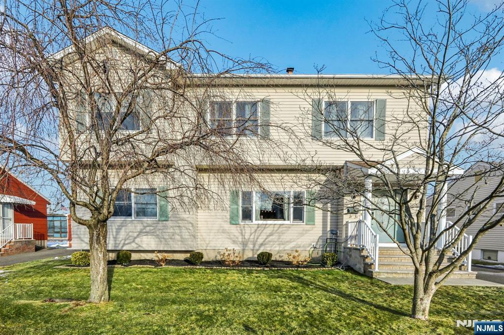 28 George Street Saddle Brook, NJ 07663 - Photo 50 of 50 a front view of a house with a yard