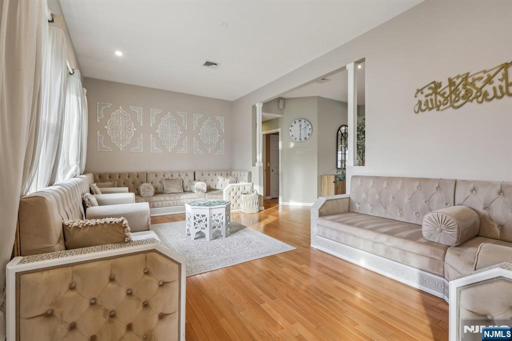 28 George Street Saddle Brook, NJ 07663 - Photo 5 of 50 a living room with furniture and wooden floor