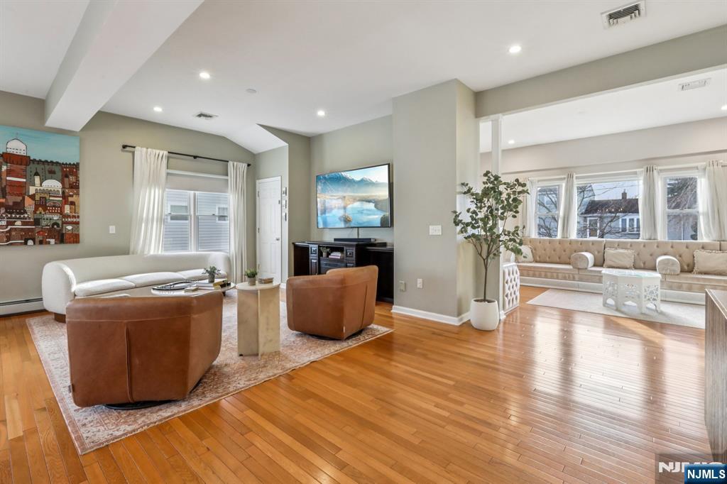 28 George Street Saddle Brook, NJ 07663 - Photo 6 of 50 a living room with furniture window and wooden floor