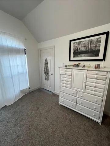 a view of a livingroom with furniture