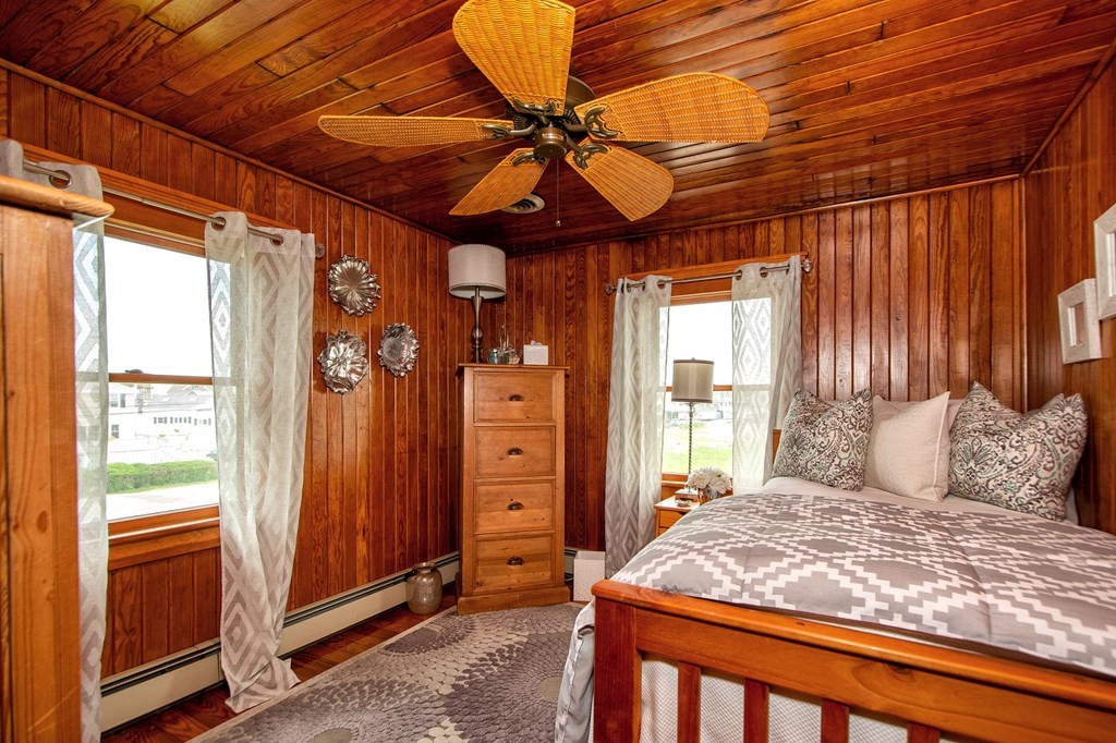 43 Otis Road Scituate, MA 02066 - Photo 25 of 32 a bedroom with a bed and a window