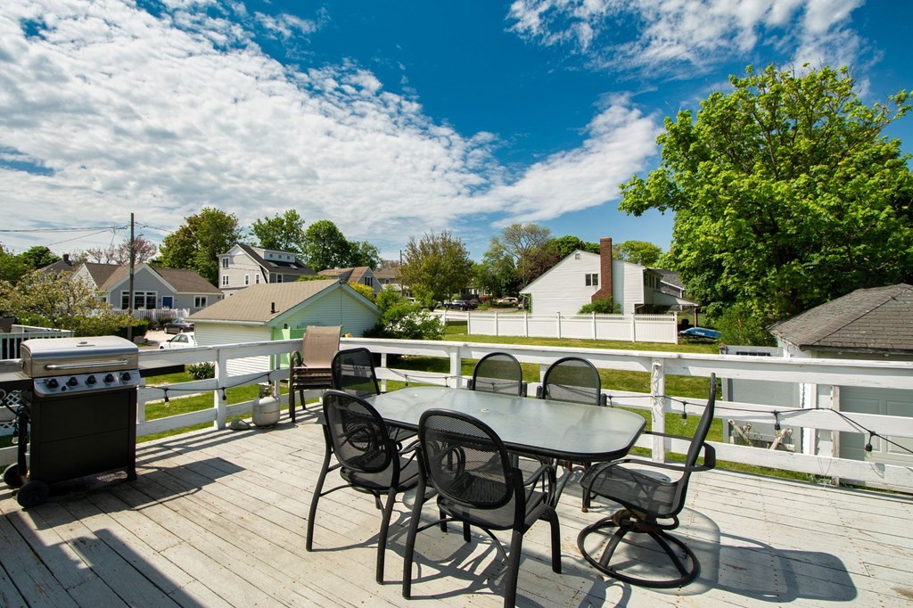 43 Otis Road Scituate, MA 02066 - Photo 29 of 32 a view of an outside dining space with furniture
