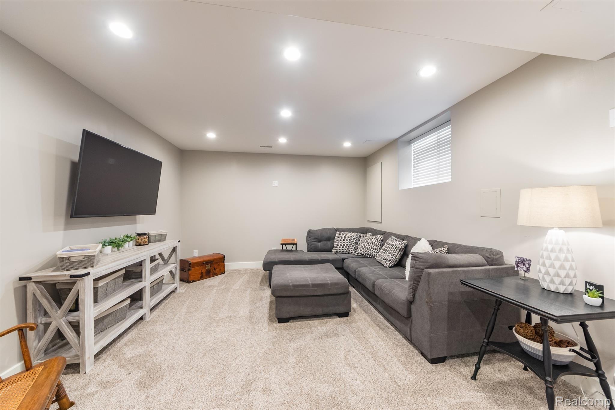 9855 Viewcrest Court Howell, MI 48843 - Photo 21 of 30 Lower level entertainment area