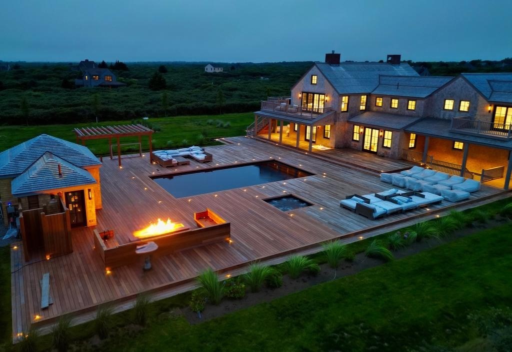 30 Devon Street, Unit THE BIG DIP Nantucket, MA 02554 - Photo 2 of 41 an aerial view of a house with a garden