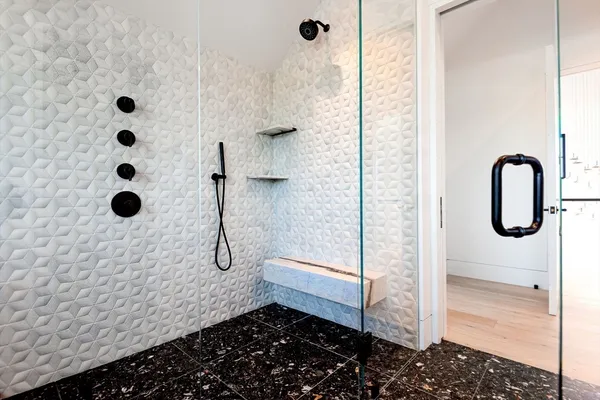 a view of living room with a flat tv screen and white walls