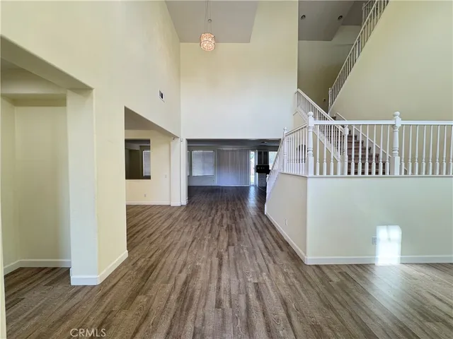 a view of entryway with wooden floor
