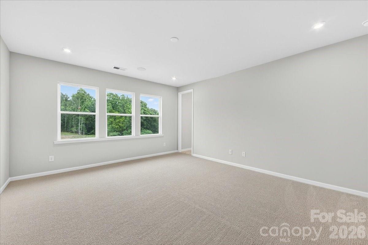 512 Webster Lane Cramerton, NC 28032 - Photo 17 of 28 an empty room with large windows