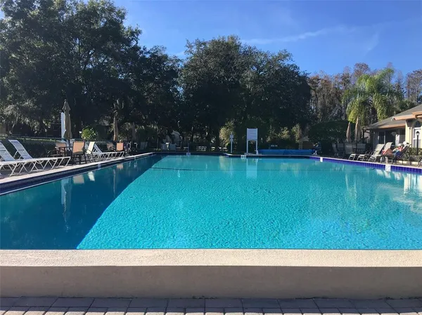 a view of an swimming pool and outdoor space