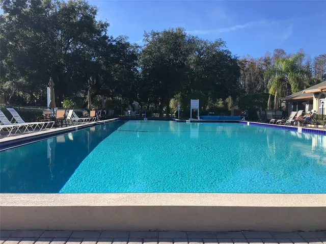 a view of an swimming pool and outdoor space