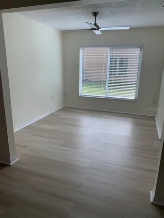 a view of livingroom with hardwood floor and window