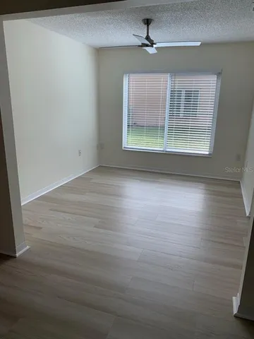 a view of livingroom with hardwood floor and window