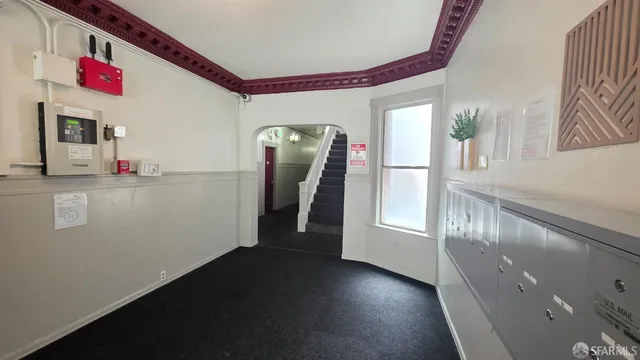 a view of a hallway with workspace