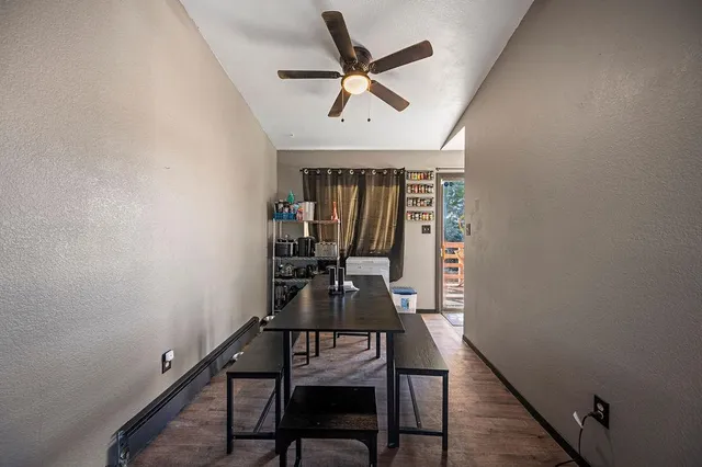 a workspace with furniture and wooden floor