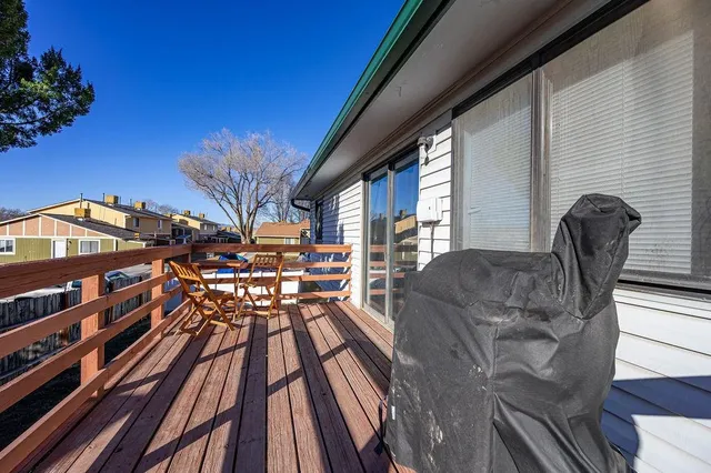 a view of balcony with furniture