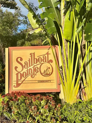 a sign that is on a brick wall