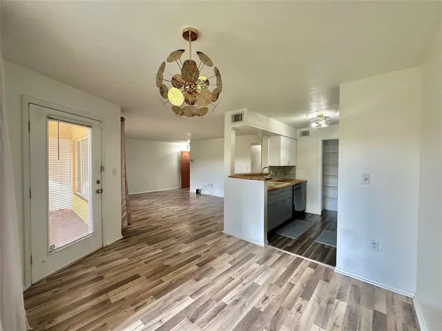 a view of a kitchen and a window