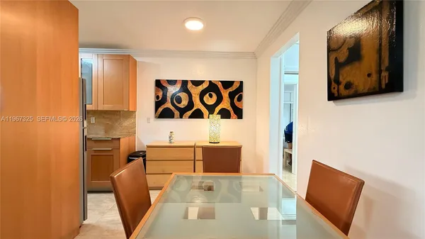 a kitchen with a stove and a refrigerator
